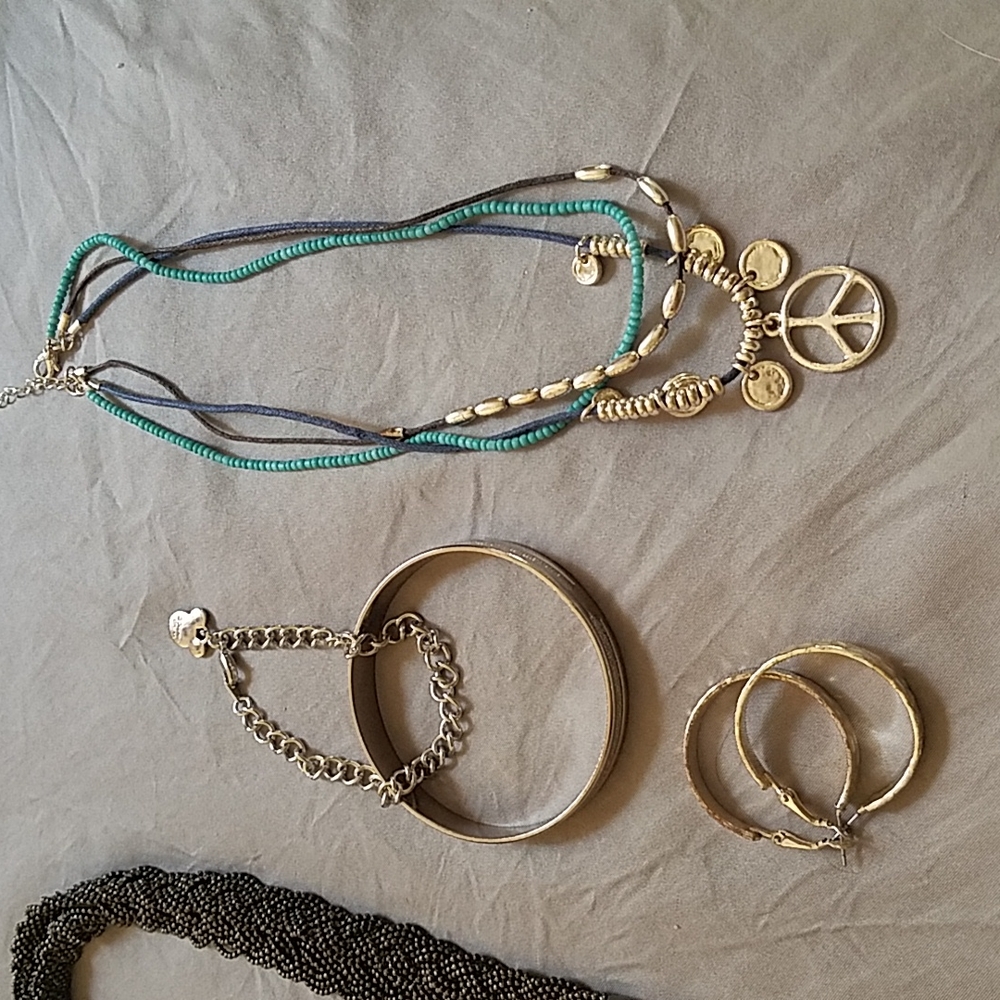 Five pieces of jewelry for 15 dollars.